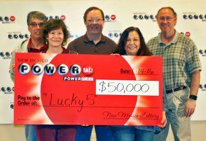 Gladys Gonzales, Alexander Kenny, Michael Wilcox and Elizabeth Wagner of Albuquerque and Steven Peddy, winners of $50,000 Powerball prize